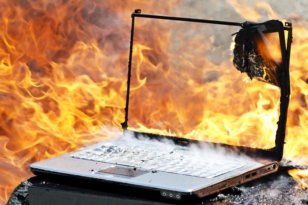 burning laptop